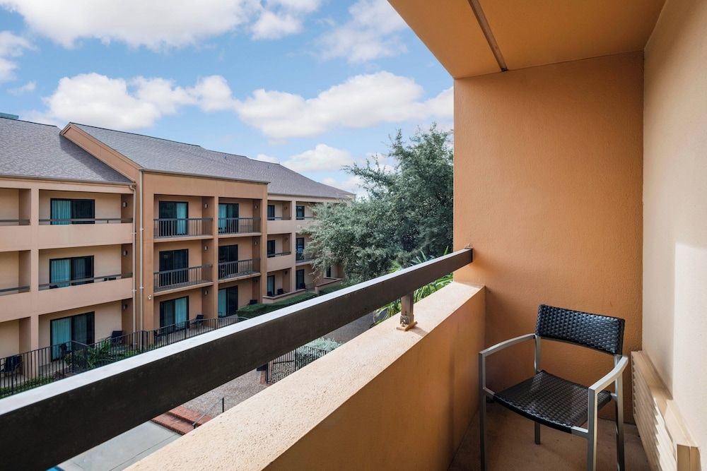 Room, 1 King Bed with Sofa bed, Non Smoking, Courtyard View (Balcony)