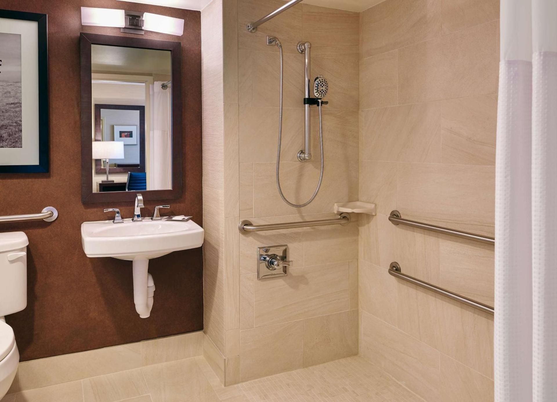 1 DOUBLE MOBILITY/HEARING ACCESS RI SHOWER