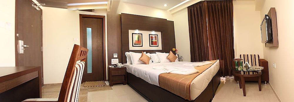 Pristine Residency Deluxe Room With Airport Transfer 4