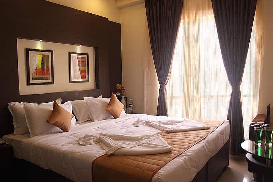 Pristine Residency Deluxe Room With Airport Transfer