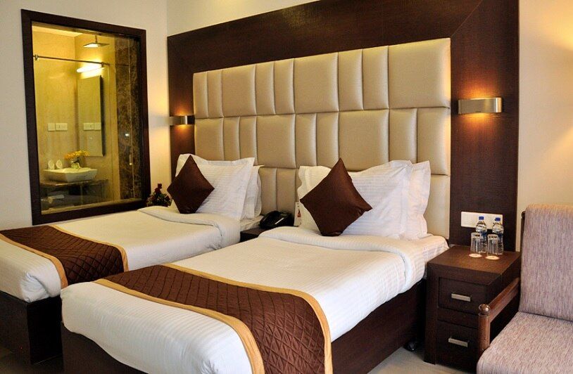 Shree Ram International Deluxe Room 7