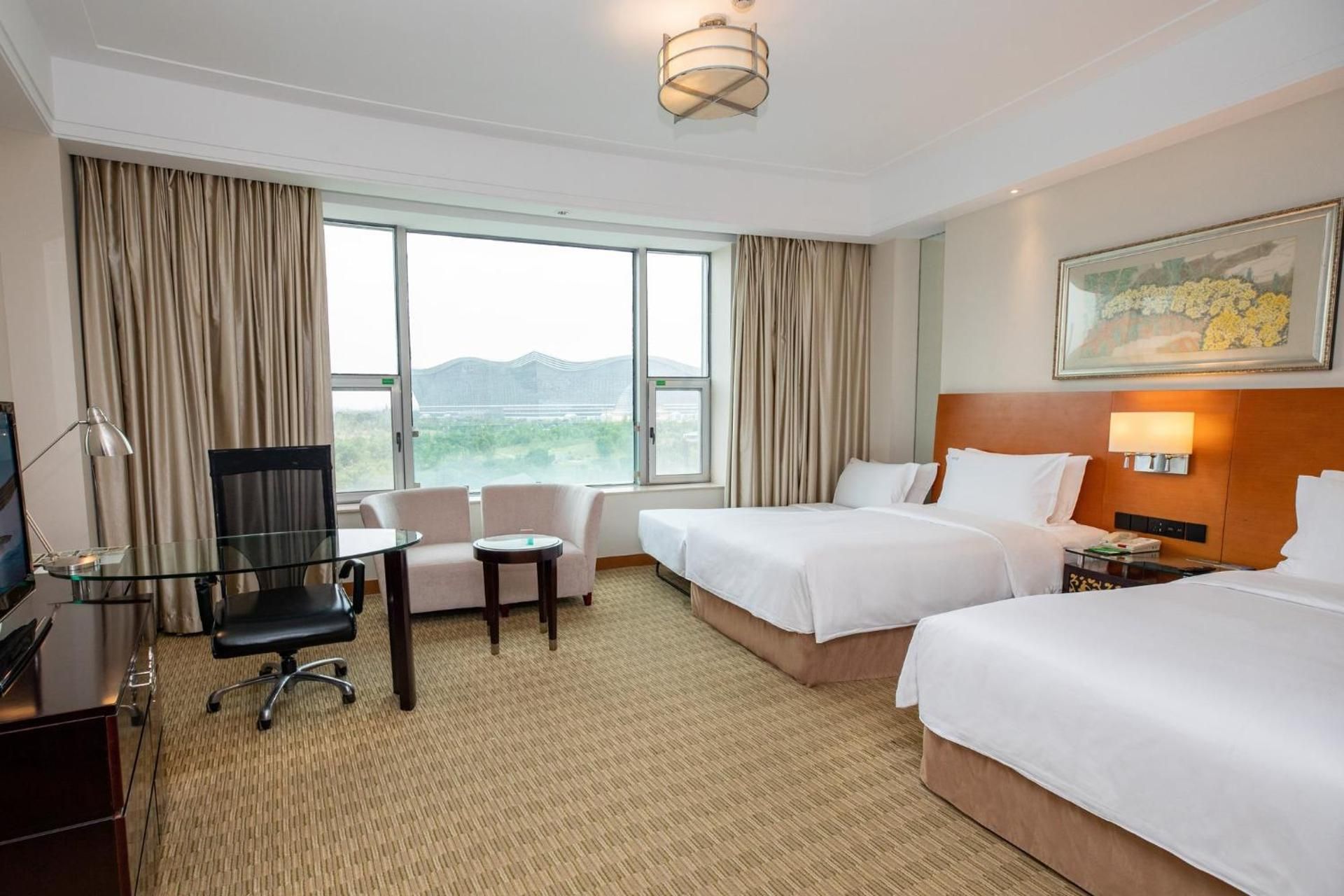 Premium Room with Two Double Beds and One Single Bed