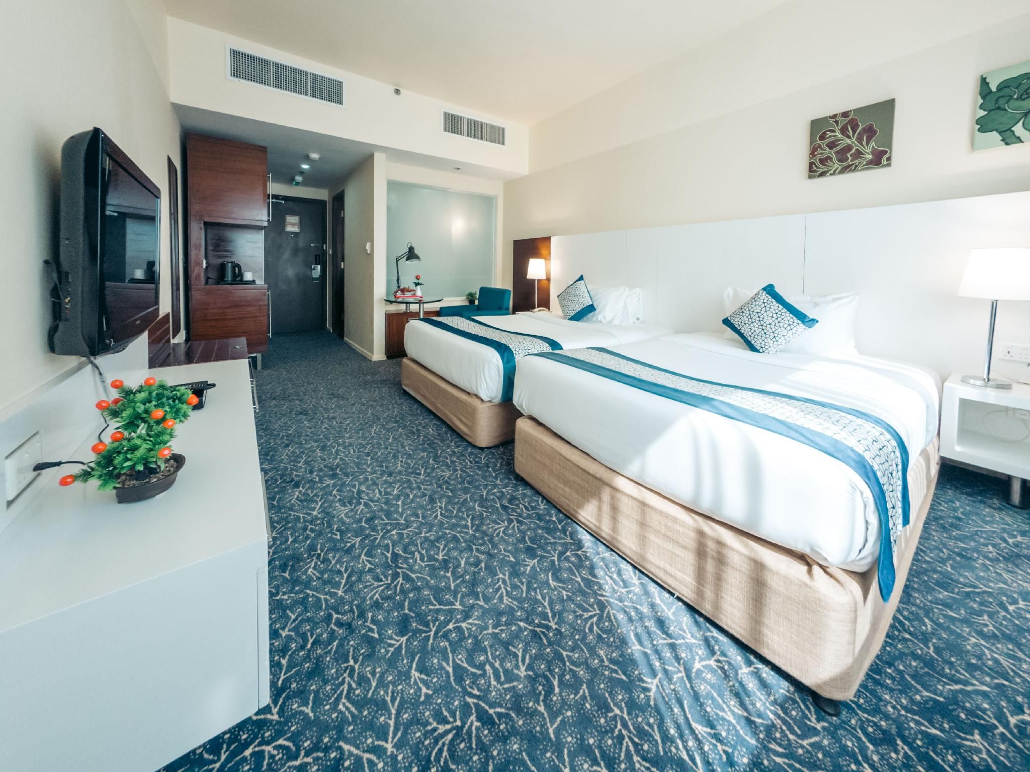 undefined Kingsgate Hotel Abu Dhabi by Millennium 7