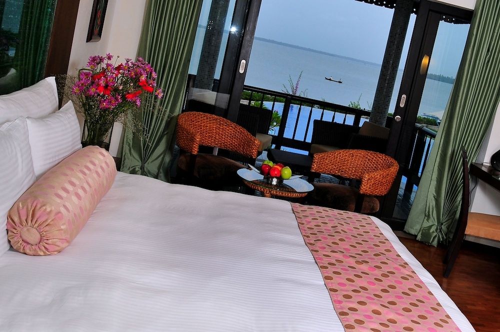 Ramada Resort by Wyndham Cochin 1 King Bed Smoking Lake View Cottage Room 3
