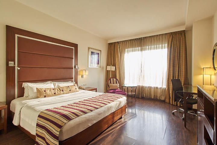 Royal Orchid Central, Pune Deluxe Room with Bathtub 2