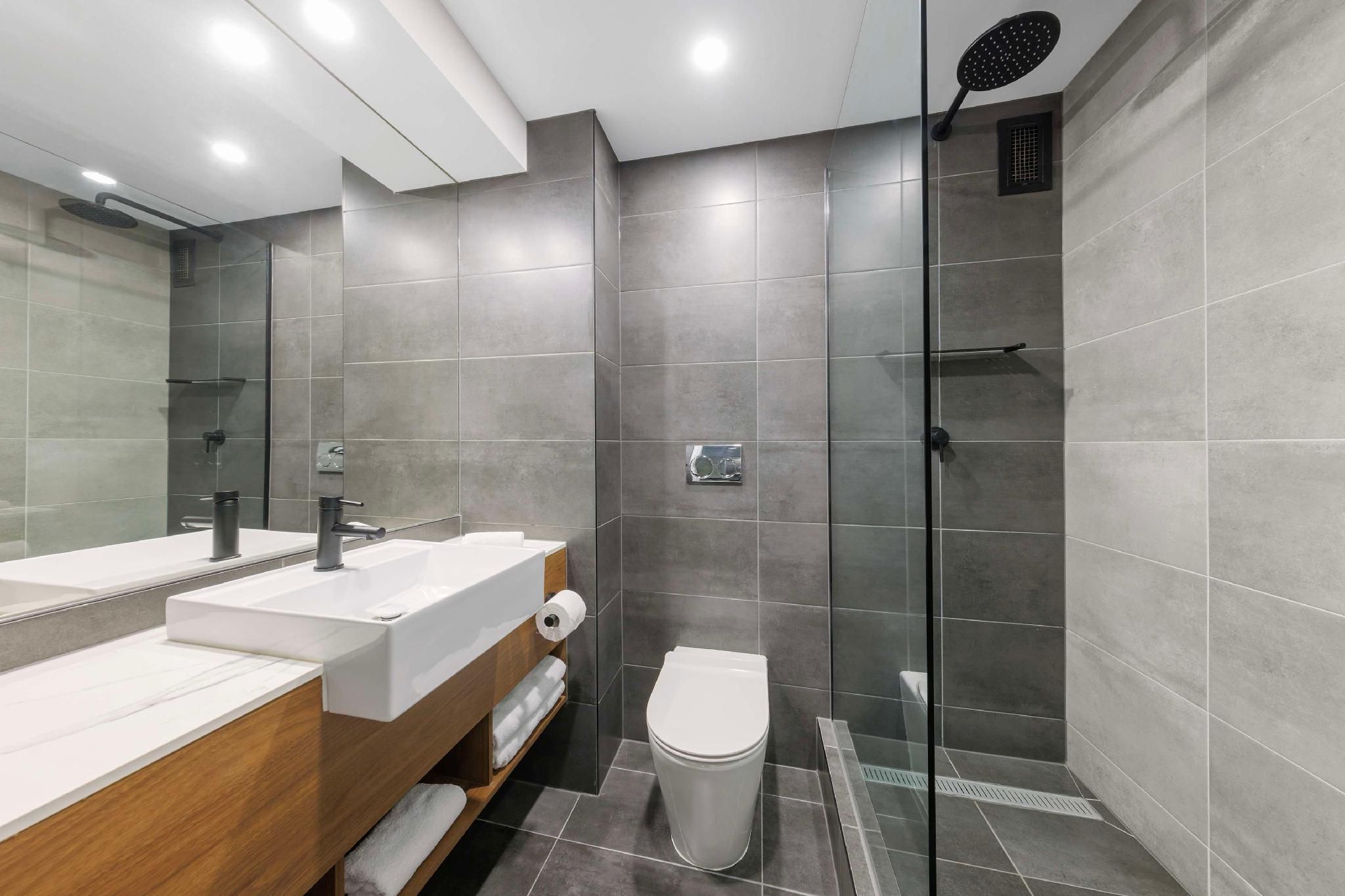 Suite - 1 King 2 Singles, Nonsmoking, Family Room, One Bedroom, Balcony