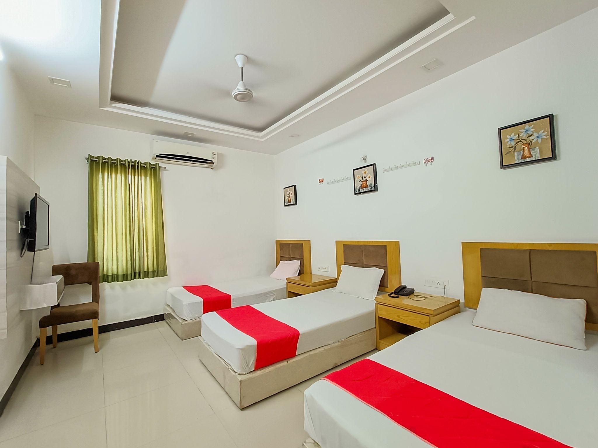 StayGuru Usha Residency Family AC Room
