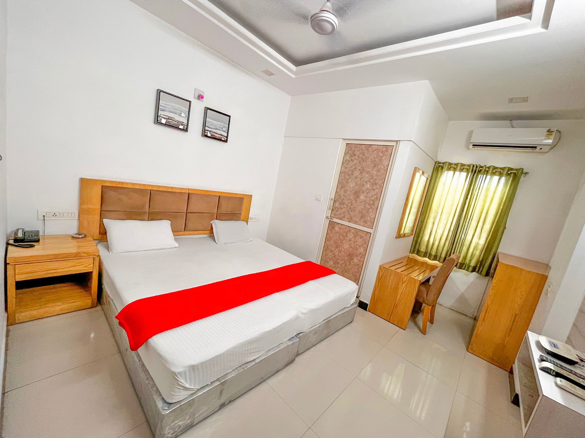 StayGuru Usha Residency Deluxe AC Room 4