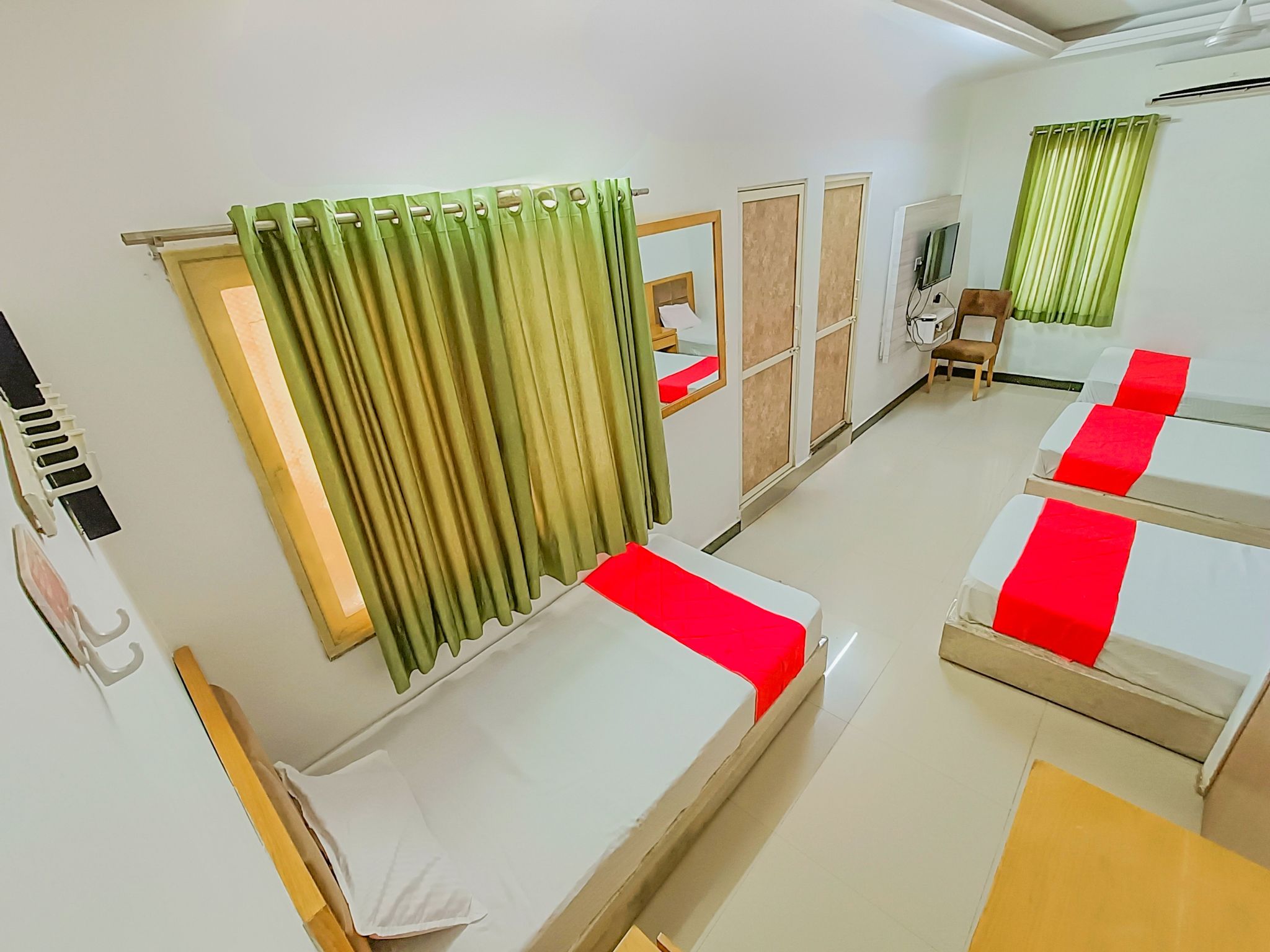 StayGuru Usha Residency Family AC Room 4