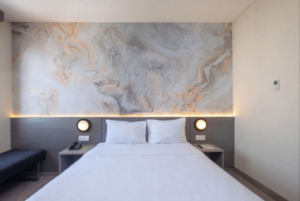 Zest Jemursari by Swiss-Belhotel International Zest New Queen Room 2