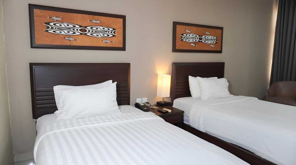 Grand Abe Hotel Deluxe Single Bed