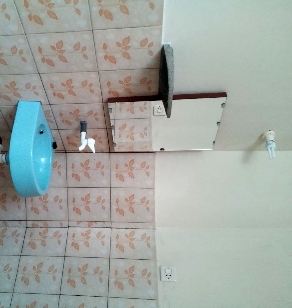 Mettaloka Guest House and Art Space Standard Triple Room, Garden View 4