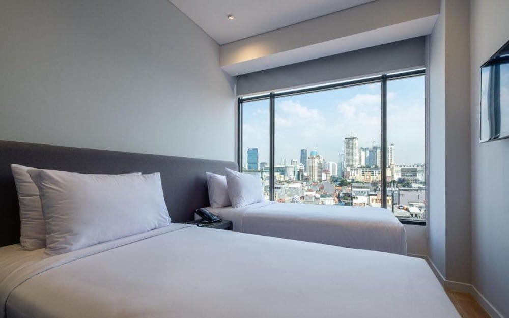 Juno Tanah Abang Jakarta Deluxe Twin Room 2