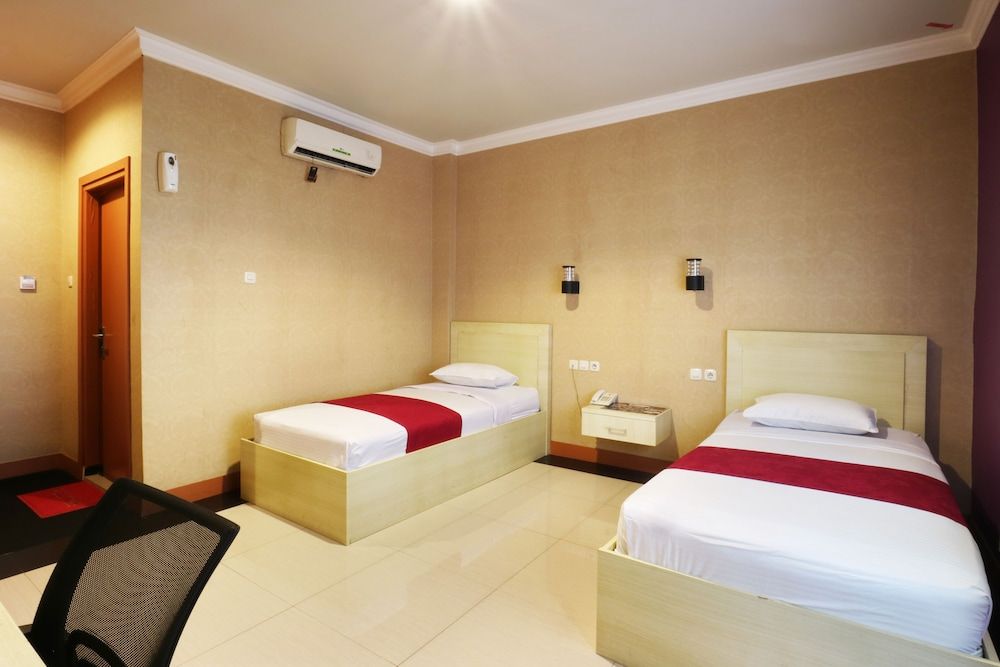 Raja Residence Standard Twin Room 4