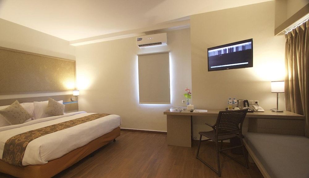 Genio Hotel Manado Deluxe Room With Breakfast 8