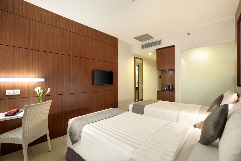 Hotel Neo Palma - Palangkaraya by ASTON Superior Room 2