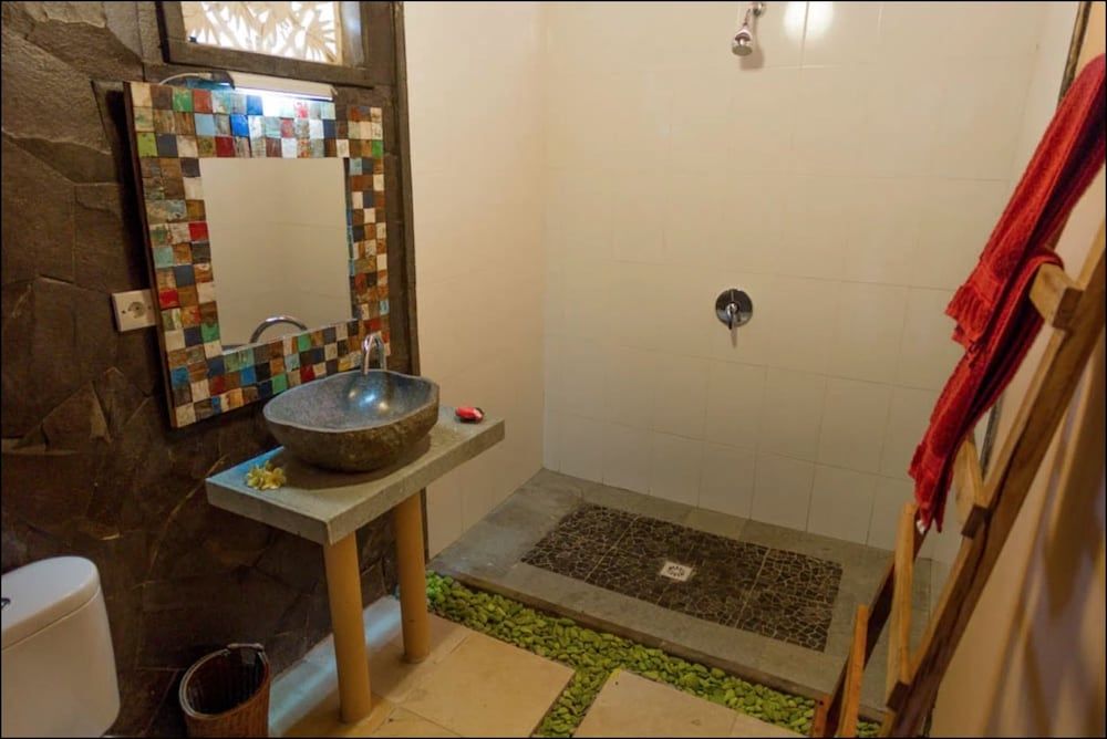 The Palms Ceningan Hotel Deluxe Bungalow, 1 King Bed, Partial Ocean View 11