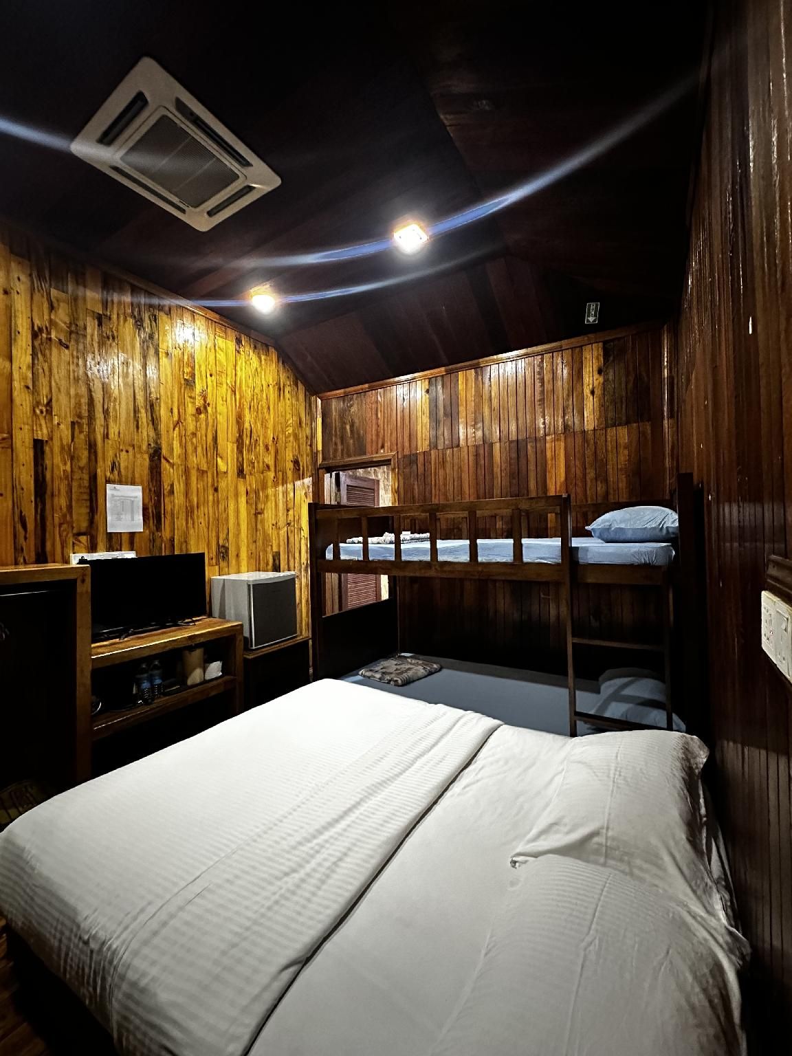 Quad Queen Room with Balcony