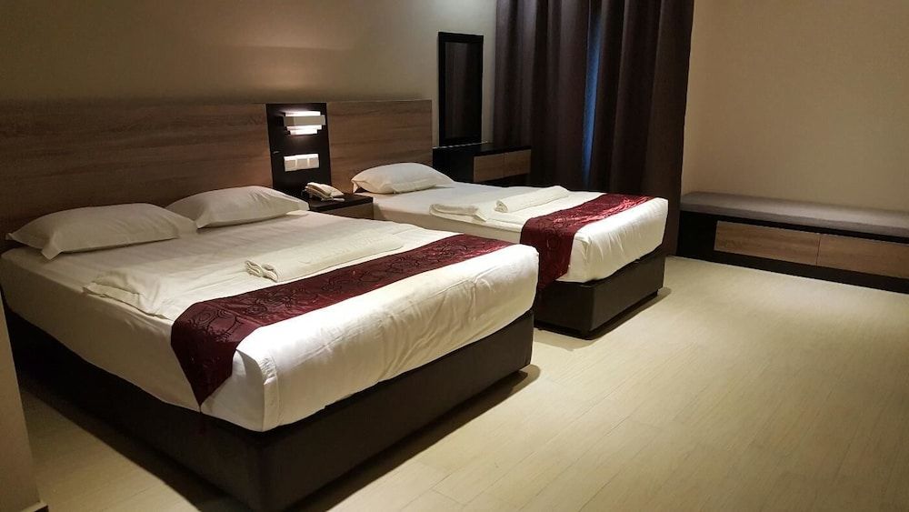 Galaxy Hotel Deluxe Triple Room