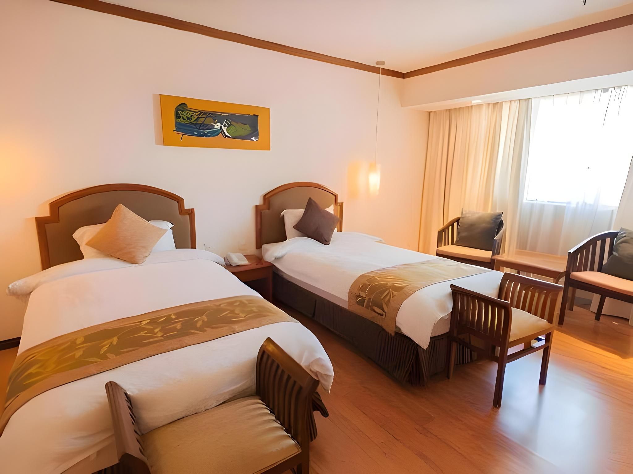 Kemena Plaza Hotel Deluxe Twin Bed 3