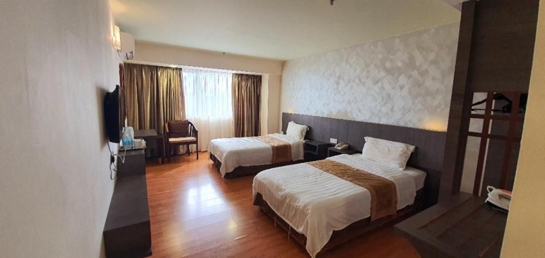 Kemena Plaza Hotel Deluxe Twin Bed