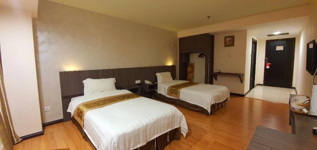 Kemena Plaza Hotel Deluxe Twin Bed 2