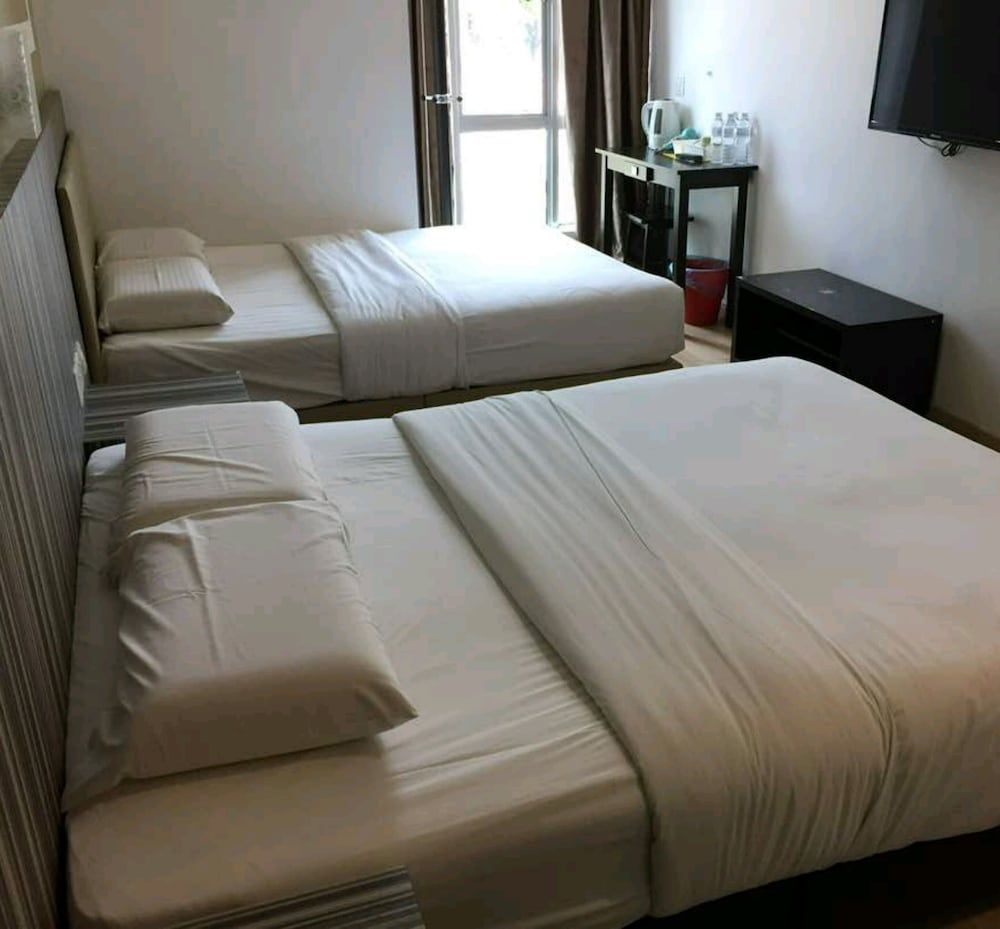 Family Quadruple Room, 2 Queen Beds, City View