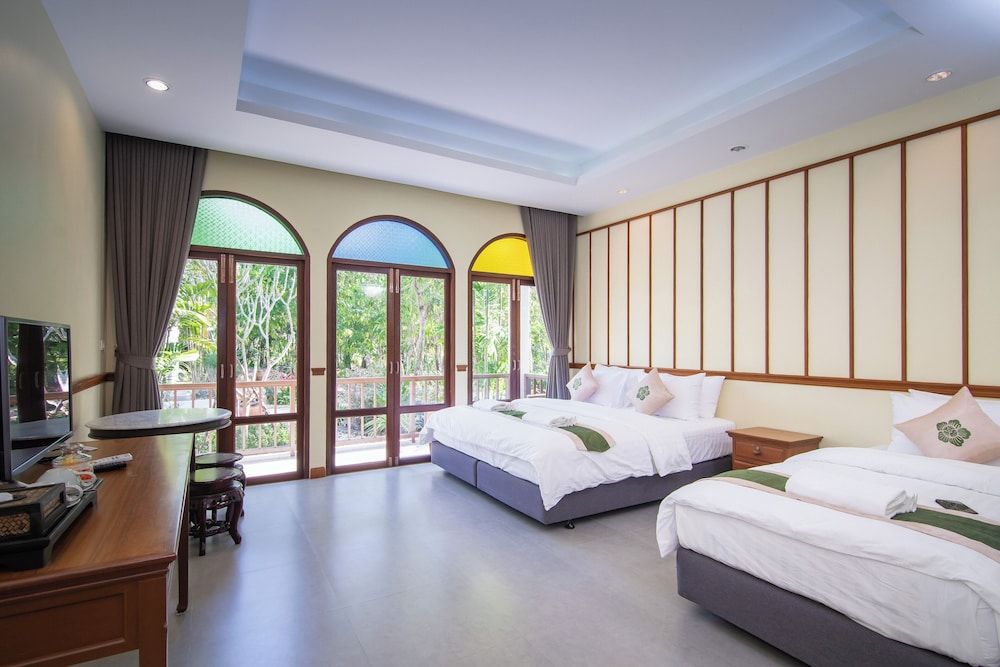 Baan Imm Sook Resort Deluxe Triple Room, 1 Bedroom, Balcony, Garden View 5
