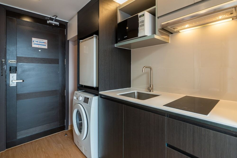 Aster Hotel and Residence New Deluxe Room 9