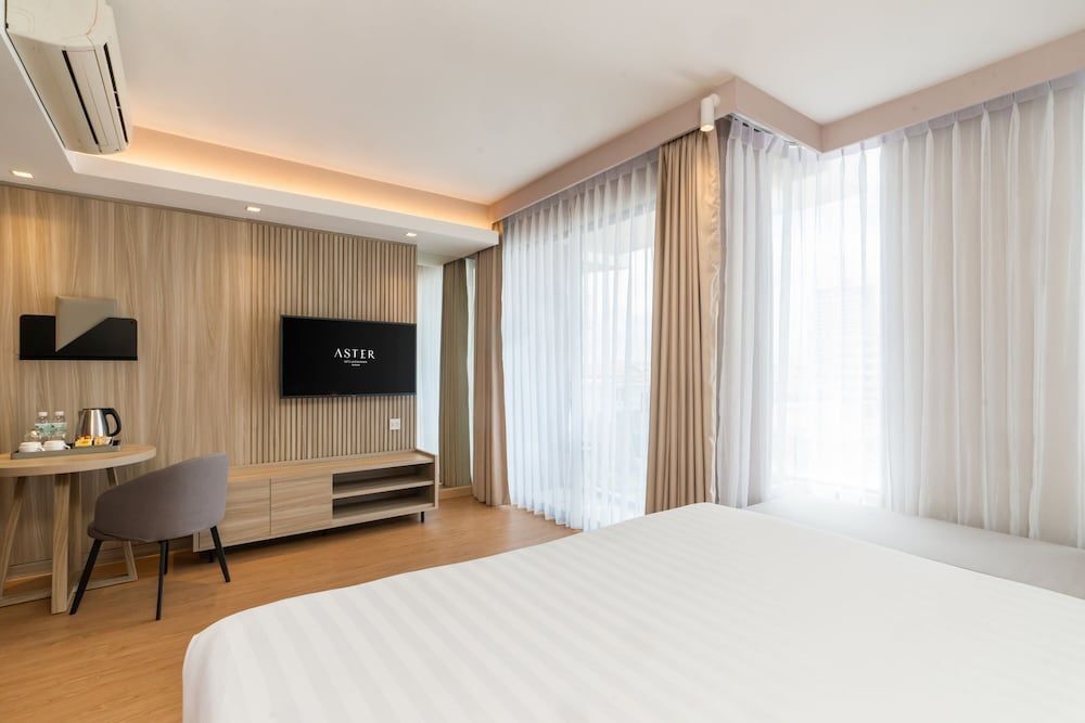 Aster Hotel and Residence New Deluxe Room 4