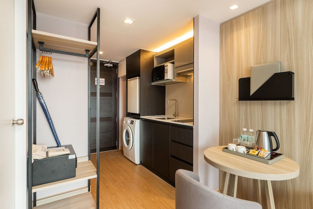 Aster Hotel and Residence New Deluxe Room 8