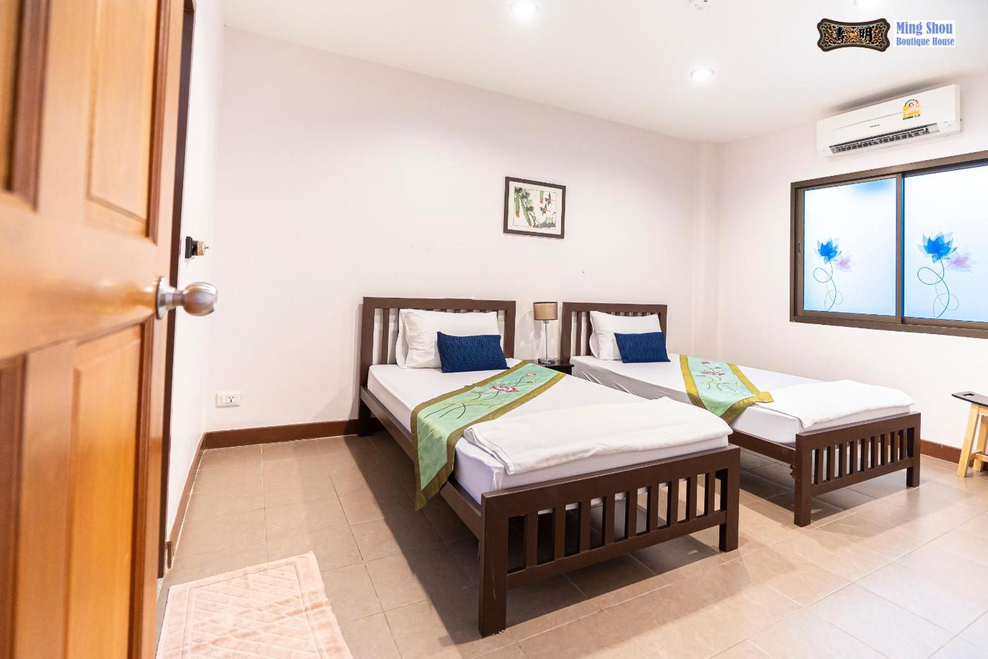 Ming Shou Boutique House Standard Twin Bed 2