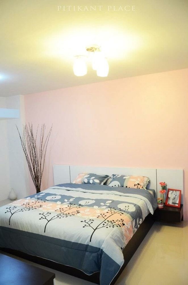 Pitikant Place Deluxe Room 9