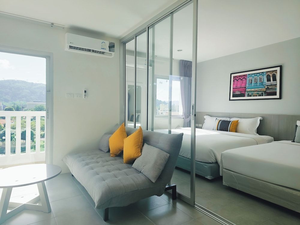 Recenta Suite Phuket Suanluang Executive Triple Room 2