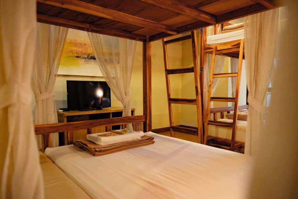 Private room with 4 beds & shared external bathroom