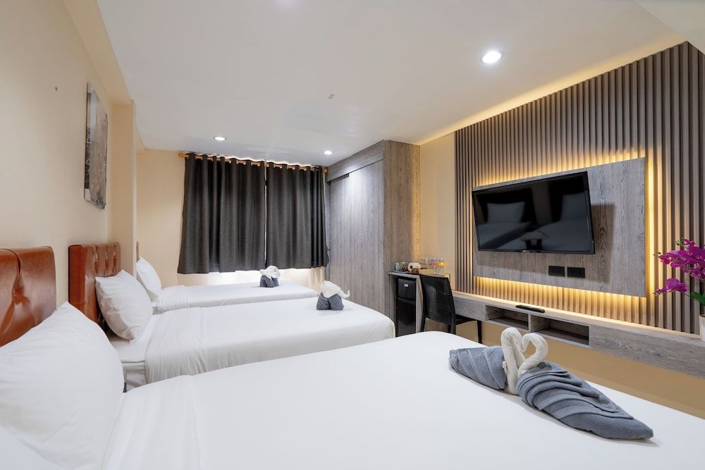 Square One Hotel Patong Family Room 4