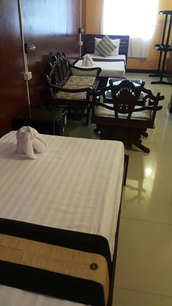 Triple Room (Shared Bathroom)