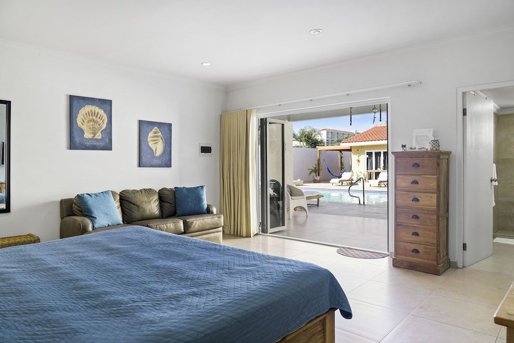 Arubas Bakval Suites Family Room, 1 King Bed with Sofa bed, Refrigerator & Microwave, Poolside 2