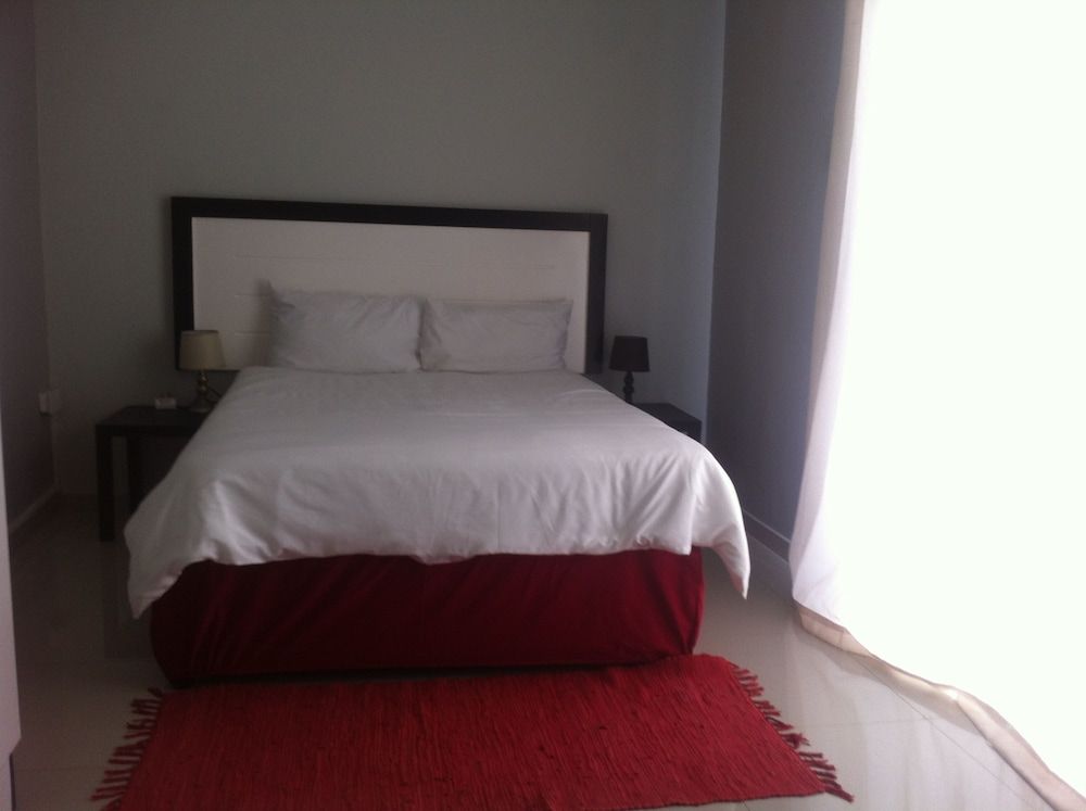 Cosy Palms Guest House Standard Double Room, Garden View