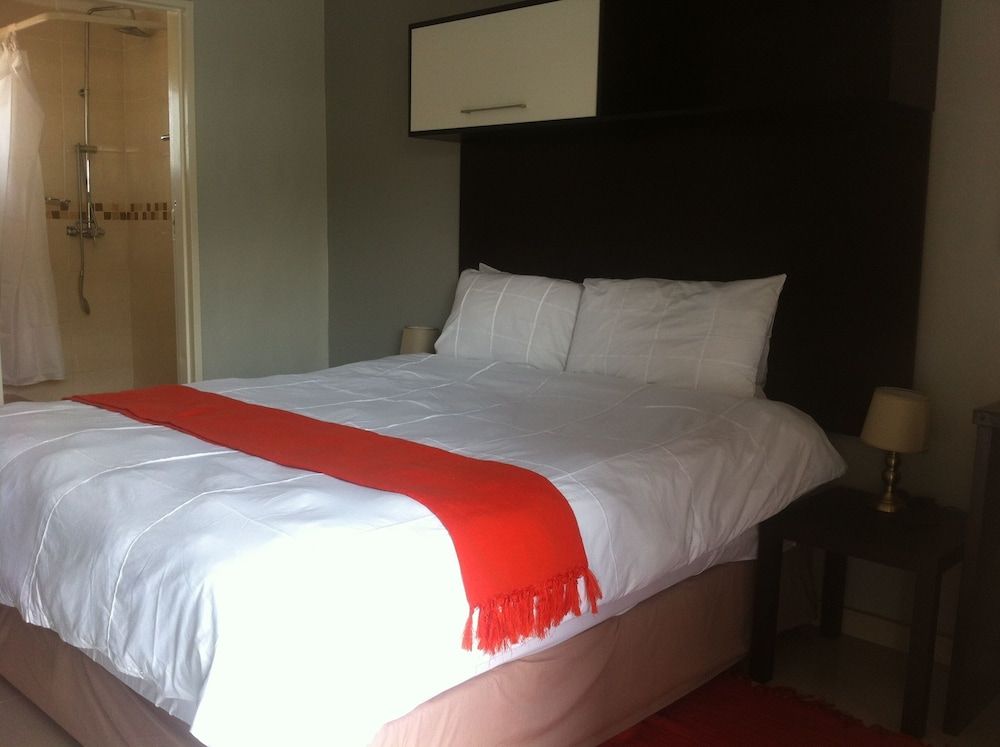 Cosy Palms Guest House Standard Double Room, Garden View 3