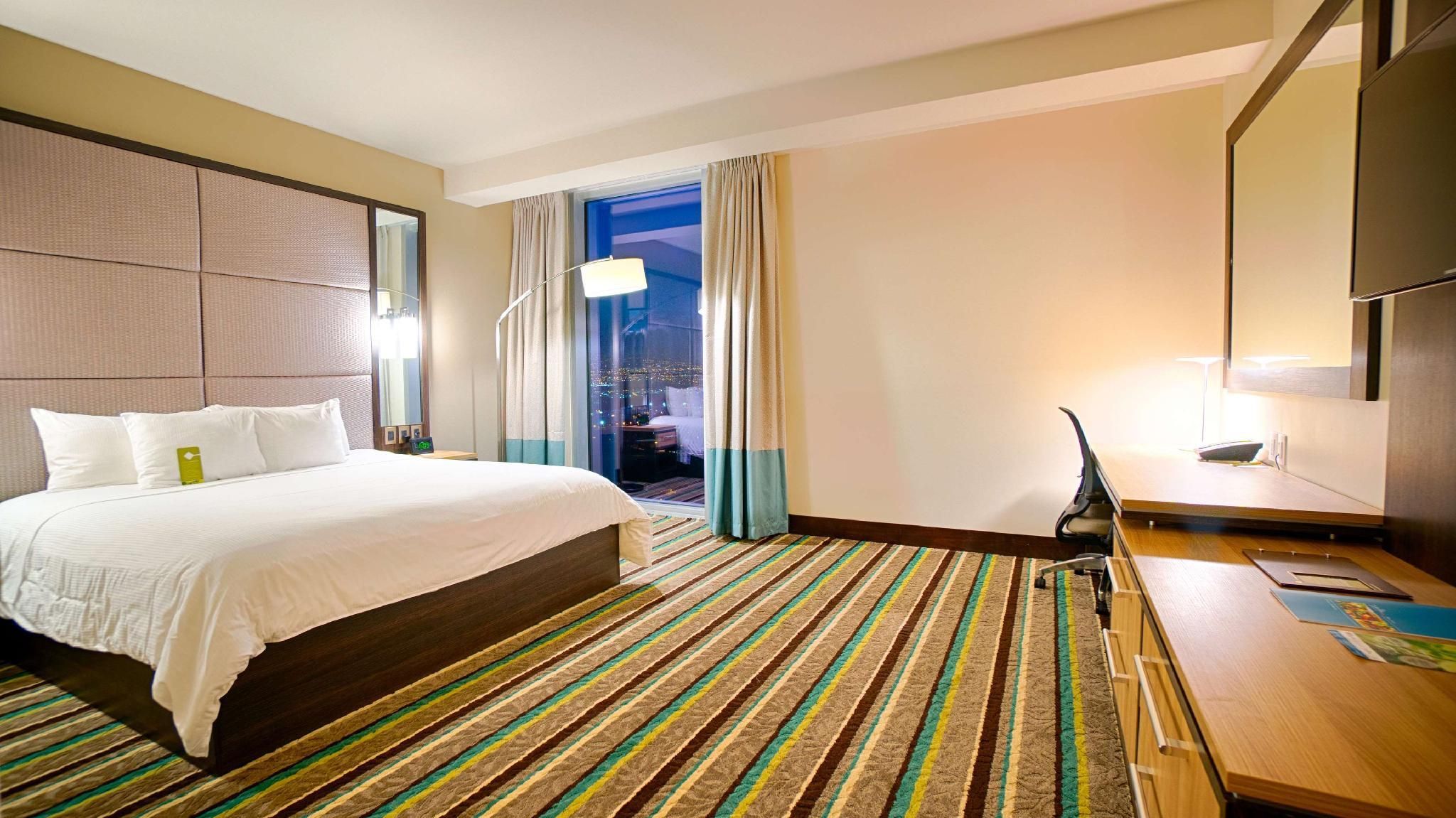 1 KING MOBILITY ACCESSIBLE W/ROLL IN SHOWER