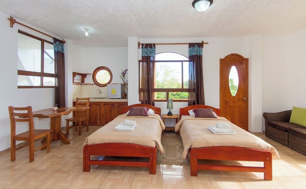 Twin Hotel Galapagos Family Suite, 2 Bedrooms, Balcony, Garden View 5
