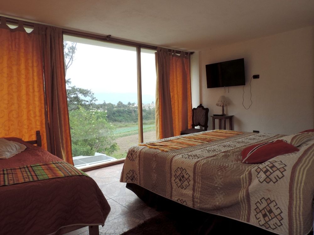 Hostal Colibrí Aeropuerto - Hostel Room