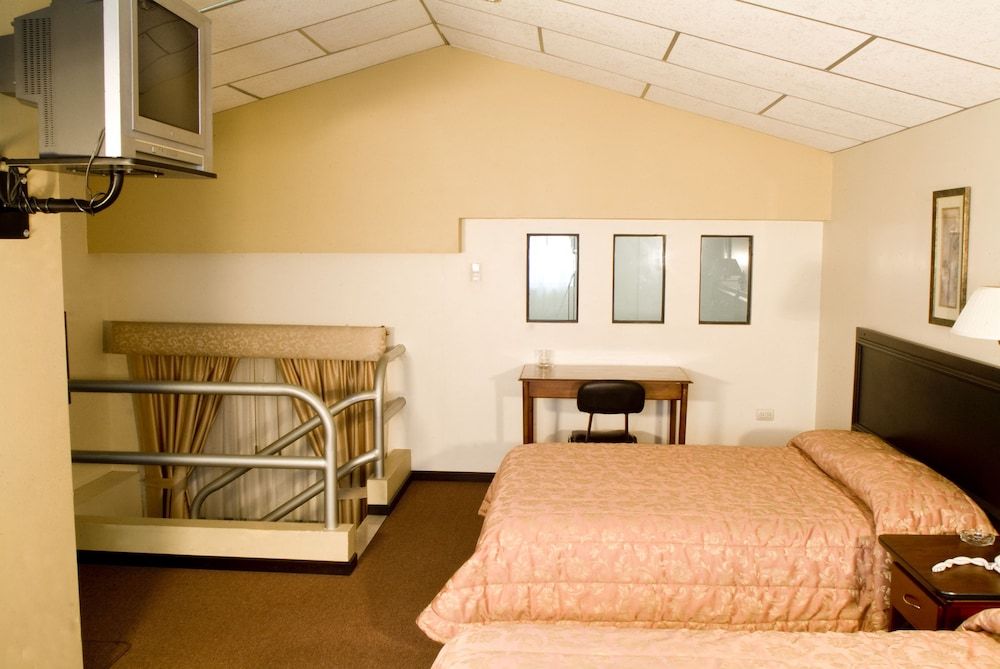 Hotel Podocarpus Triple Room 5