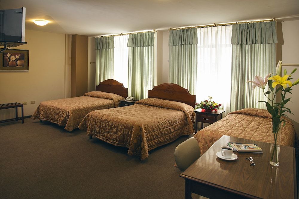 Hotel Podocarpus Triple Room 2