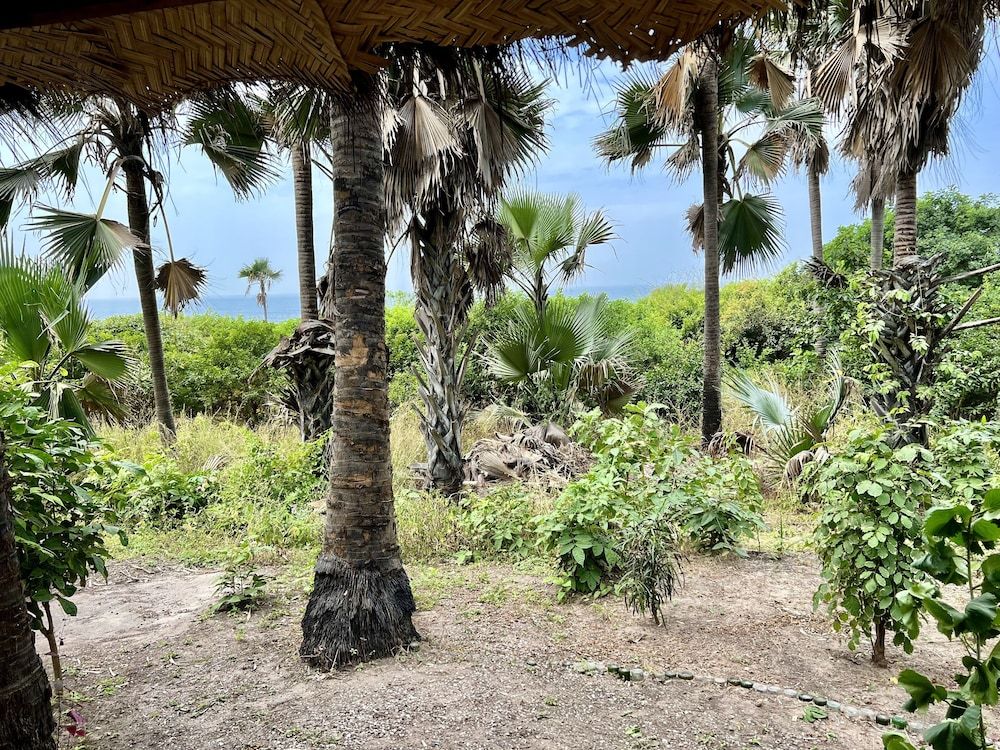 Nemasu Eco-Lodge Traditional Triple Room, 1 Bedroom, Partial Sea View, Garden Area 5