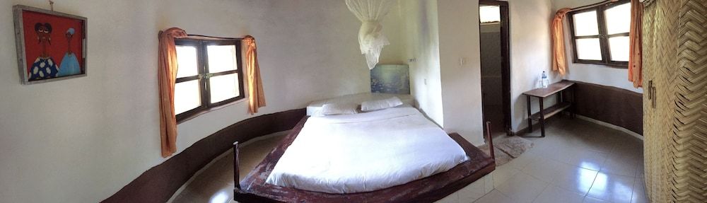 Nemasu Eco-Lodge Traditional Triple Room, 1 Bedroom, Partial Sea View, Garden Area 2