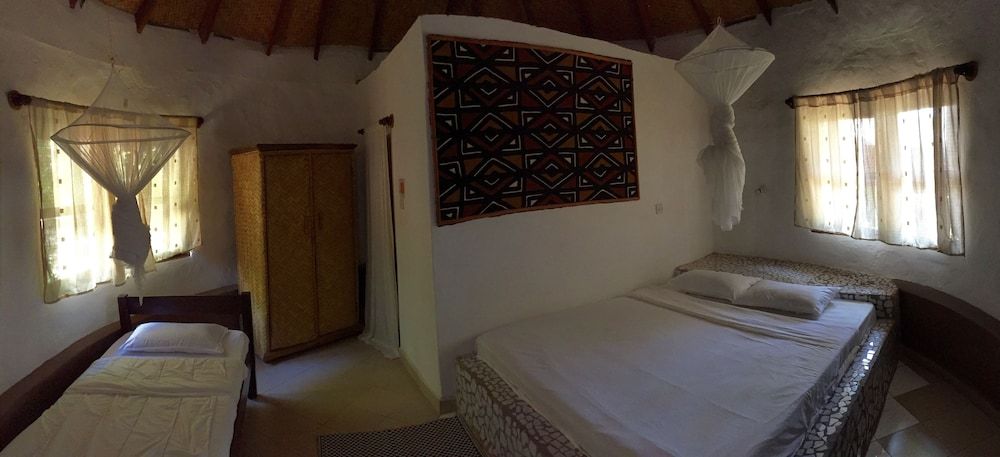 Nemasu Eco-Lodge Traditional Triple Room, 1 Bedroom, Partial Sea View, Garden Area 3