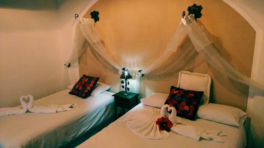 Junior Twin Room, Private Bathroom, Courtyard Area (1 double bed and 1 single bed)