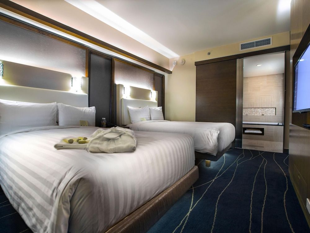 Dusit Thani Guam Resort Executive Suite, 2 Double Beds- Children (6-11 yrs old) will incur additional charge for breakfast